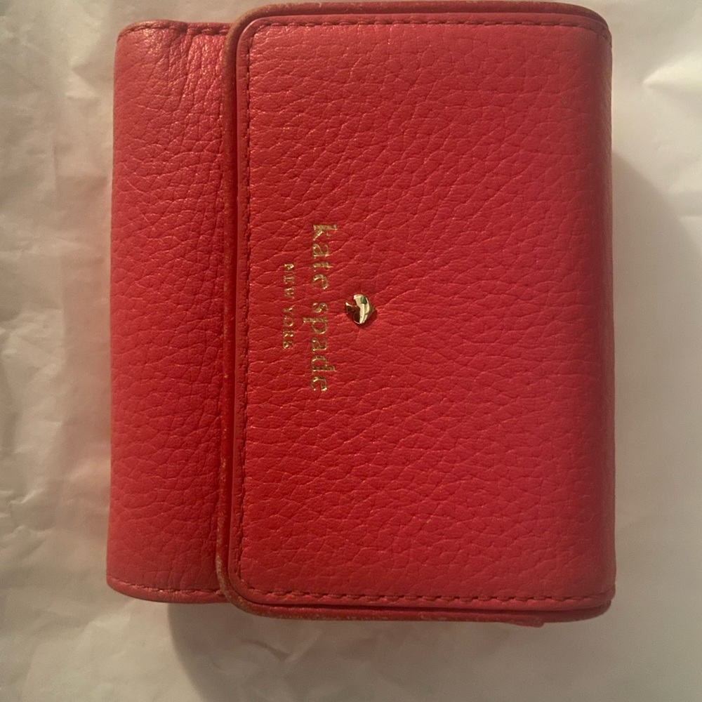 Coral colored Kate spade wallet